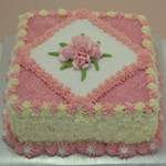 Pink themed cream cake